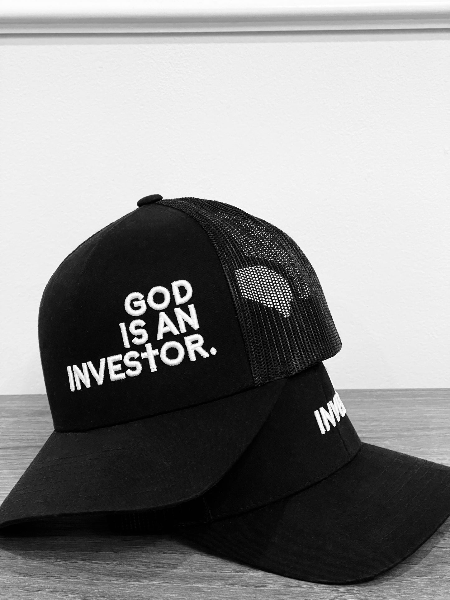 GOD IS AN INVESTOR. Hat